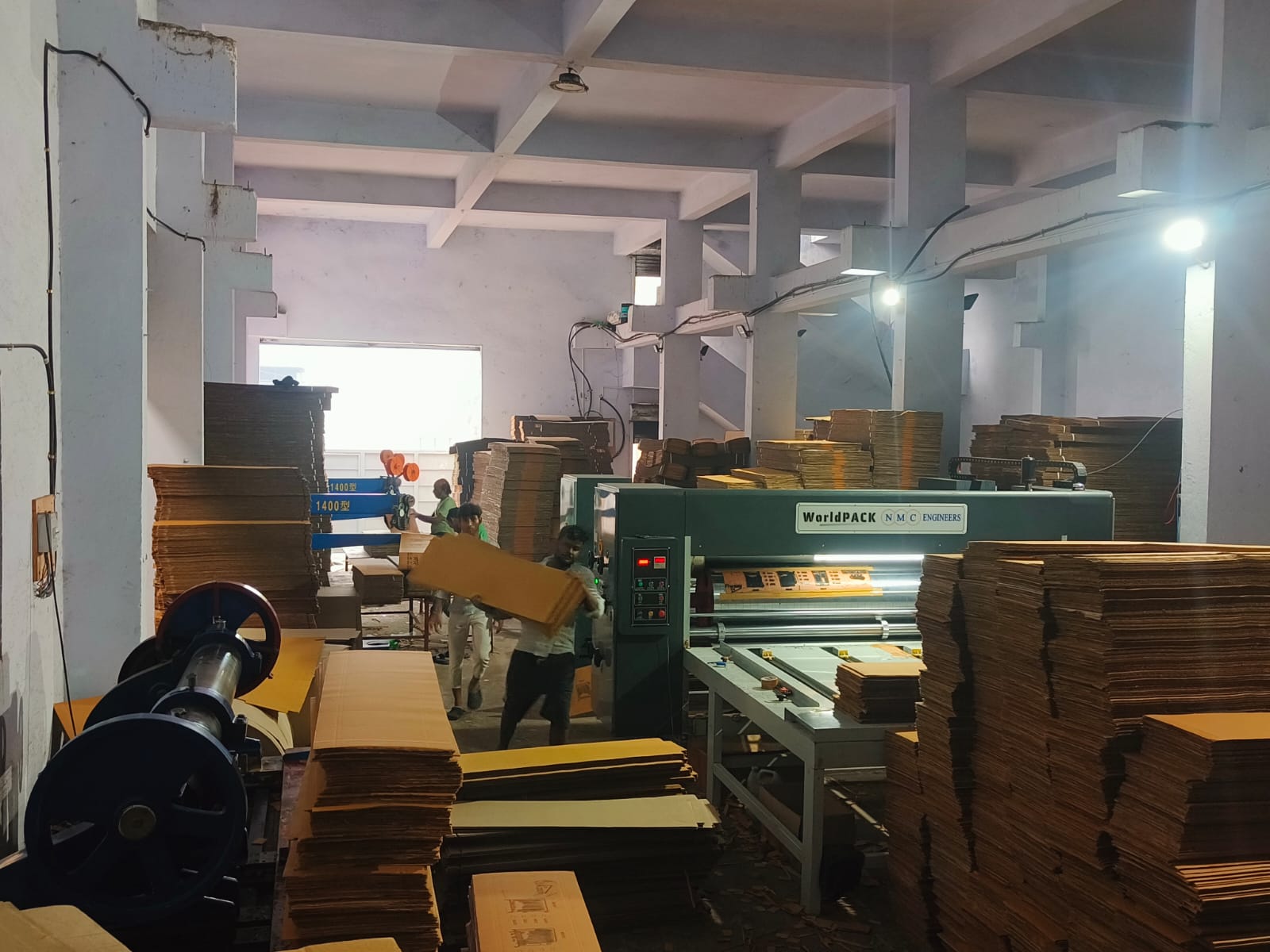 Workers at the Maa Ashapura Print & Pack unit, Ahmedabad